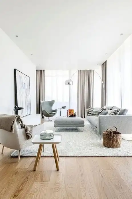 Hardwood flooring features a diagonal layout and a subtle surface sheen across a clean, even installation.