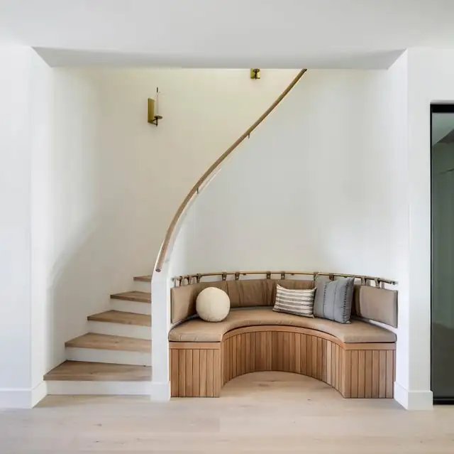 Hardwood flooring features visible grain and a consistent pattern across a clean, even installation.