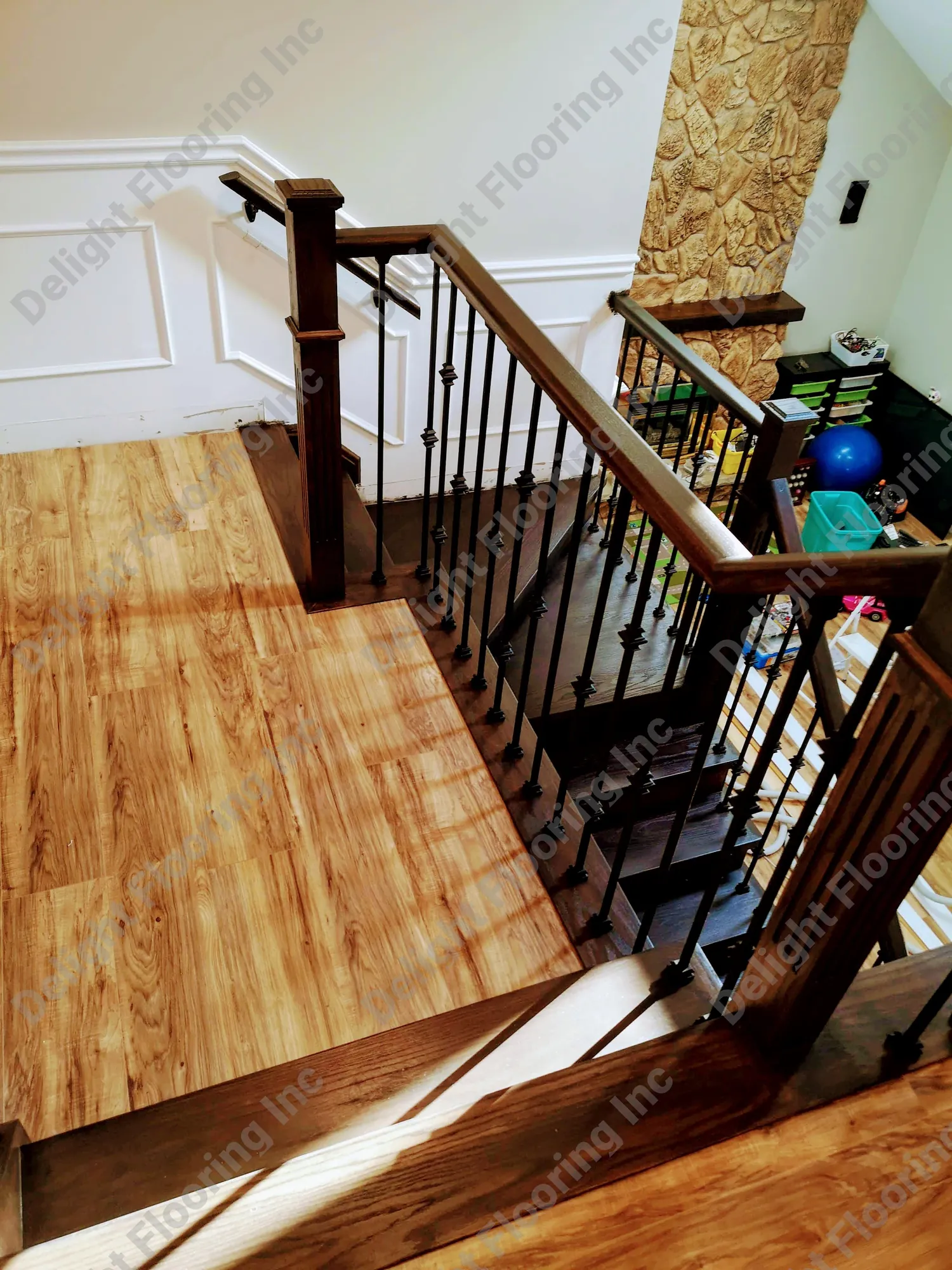 Wooden staircase with hardwood treads and risers.