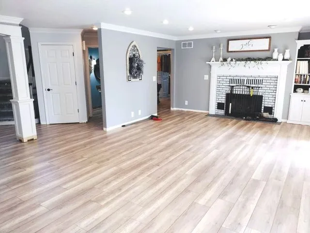 Laminate flooring shows a consistent pattern across the installed area.